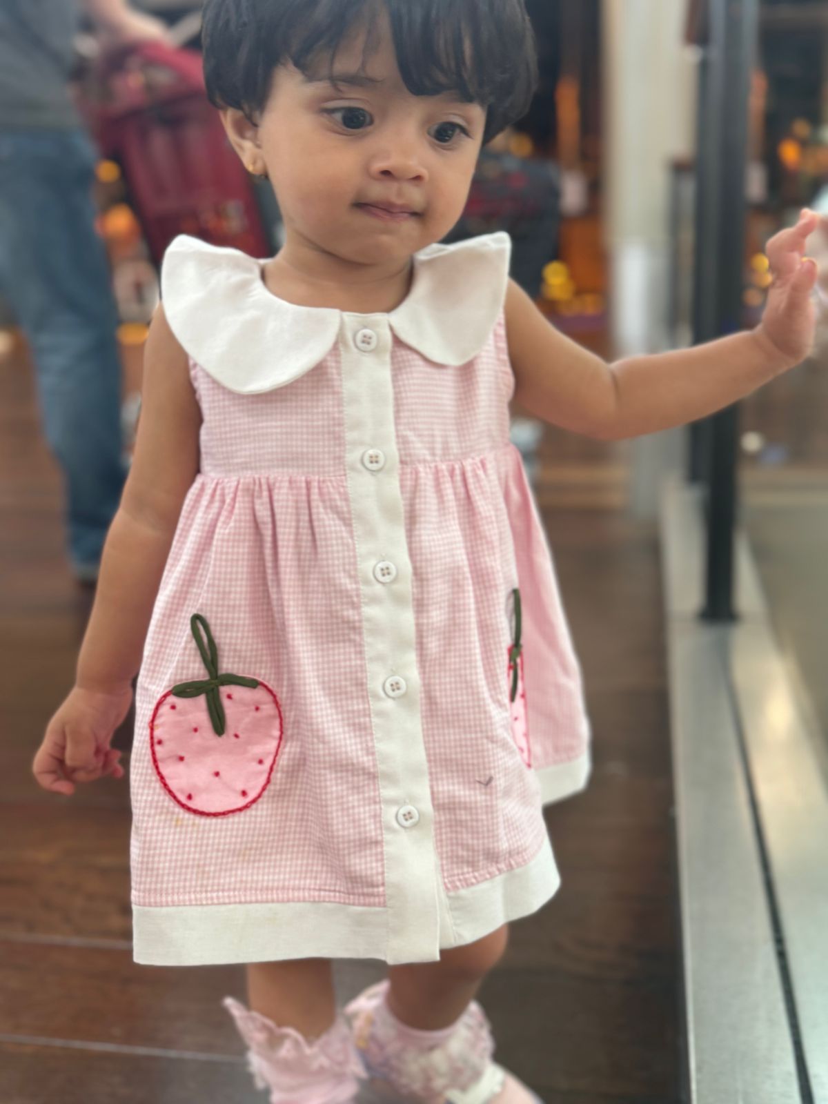 Adorable light pink A-line dress with white accents and cute strawberry embroidery - www.styletriggers.com