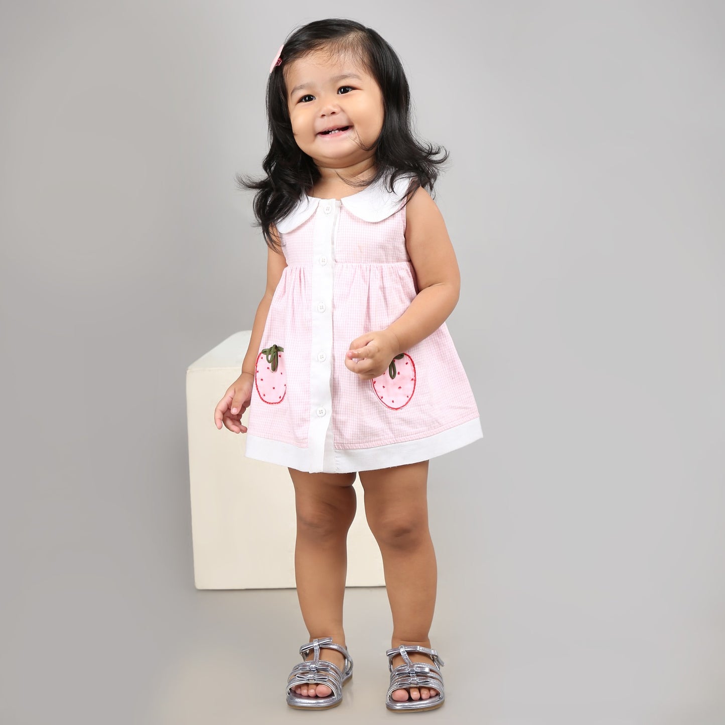 Adorable light pink A-line dress with white accents and cute strawberry embroidery
