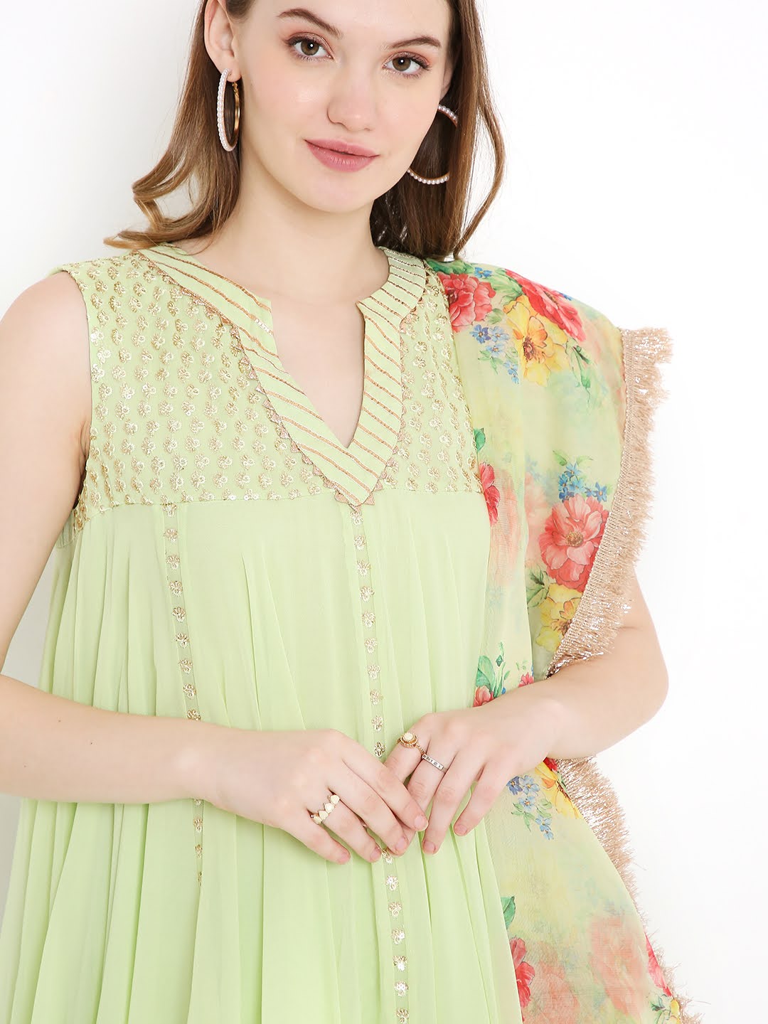 Top-Embroidered yoke with gota detailing on the neckline and flared bottom on the kurta - www.styletriggers.com