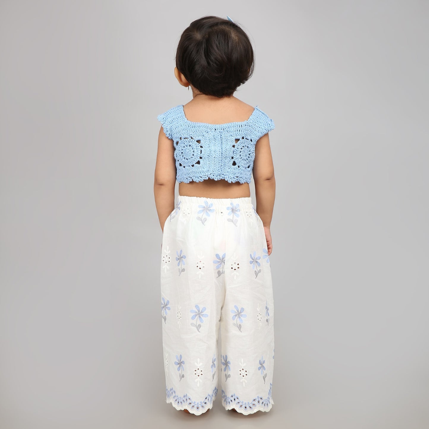 Chic sky blue crochet top with white floral embroidered pants