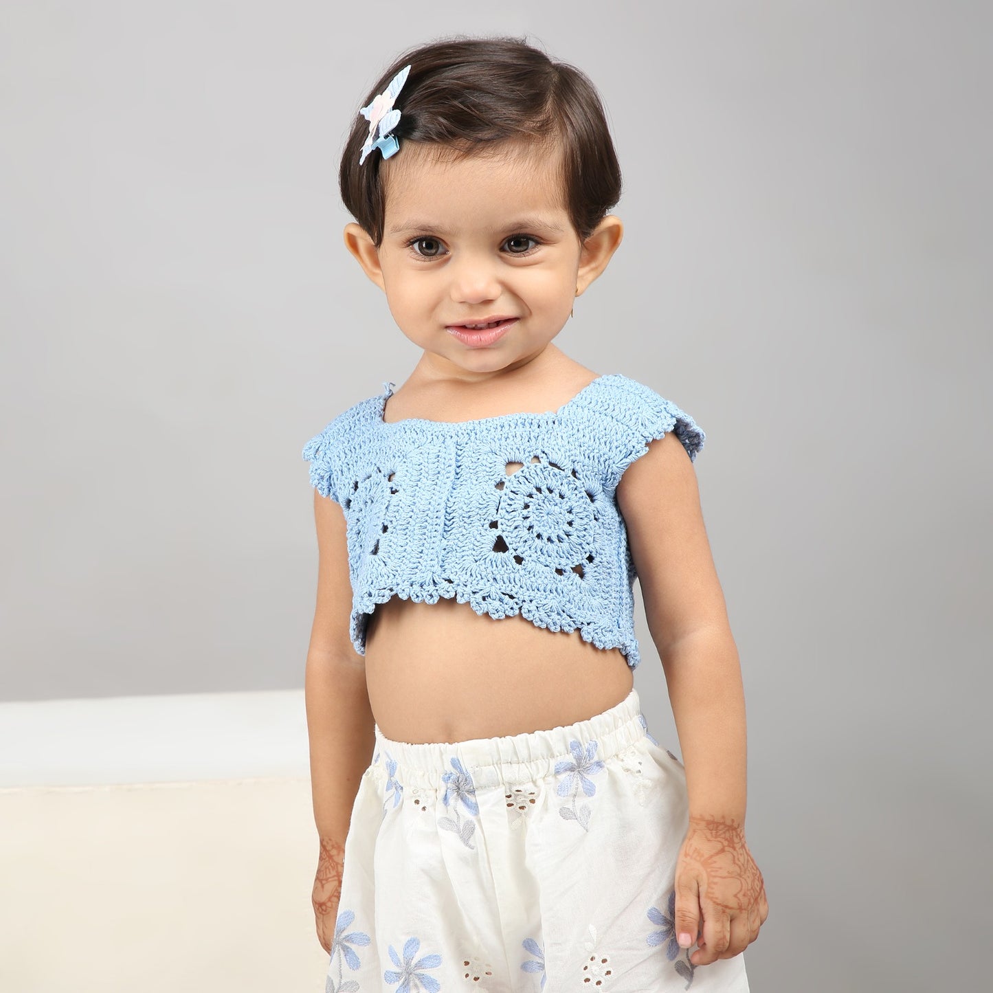 Chic sky blue crochet top with white floral embroidered pants