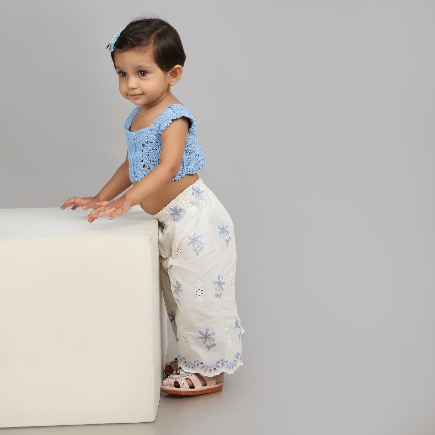 Chic sky blue crochet top with white floral embroidered pants