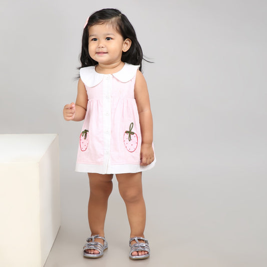 Adorable light pink A-line dress with white accents and cute strawberry embroidery
